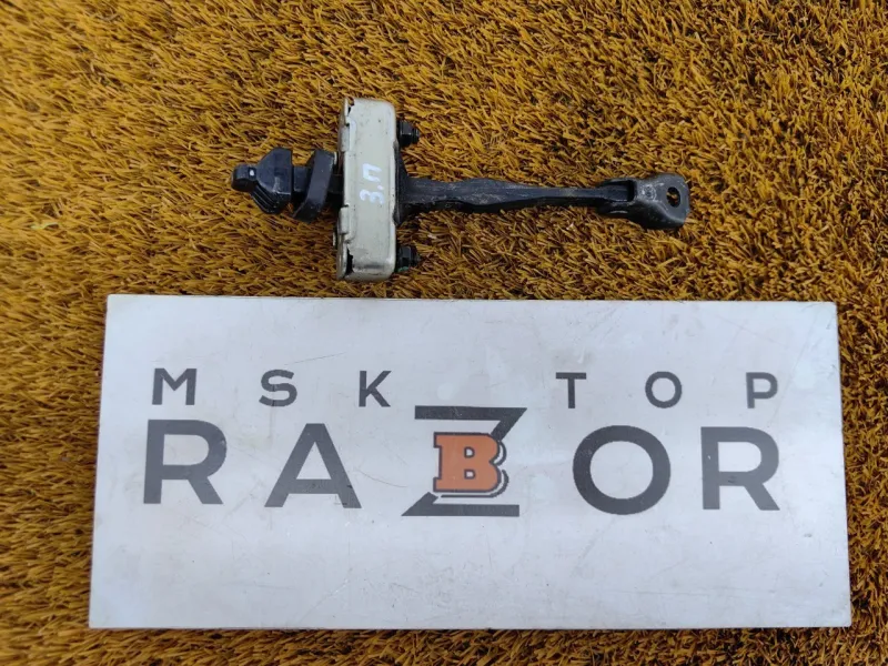 Ограничитель двери