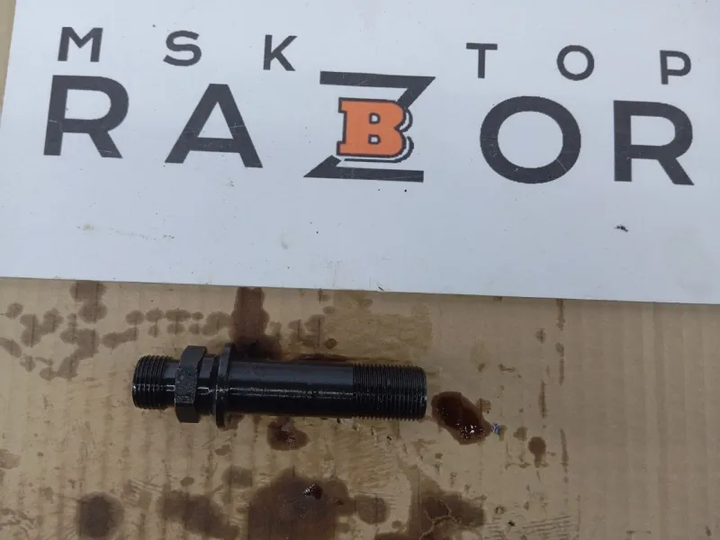 Болт крепления масляного фильтра