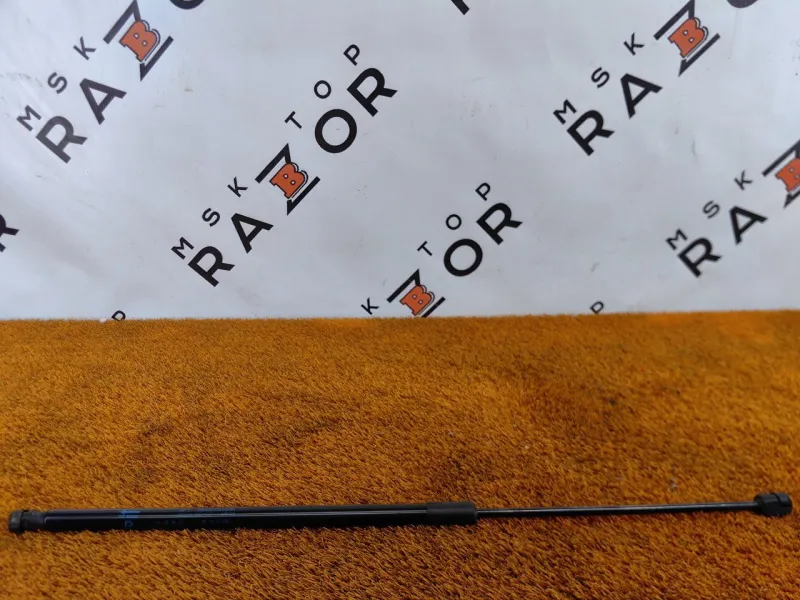 Амортизатор капота