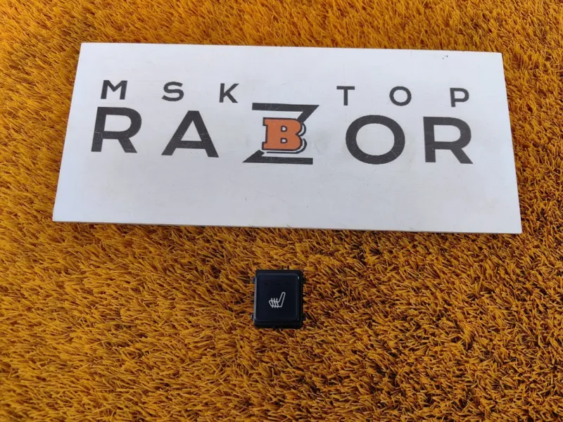 Кнопка обогрева сидений