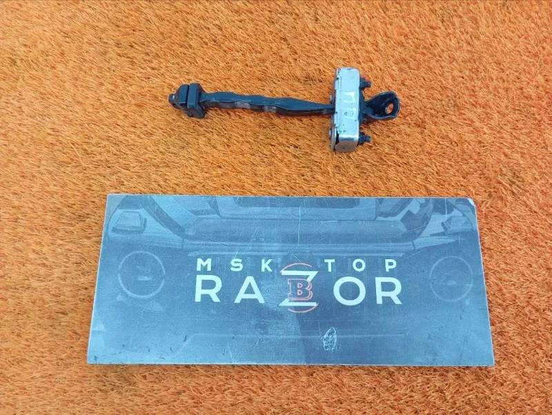 Ограничитель двери