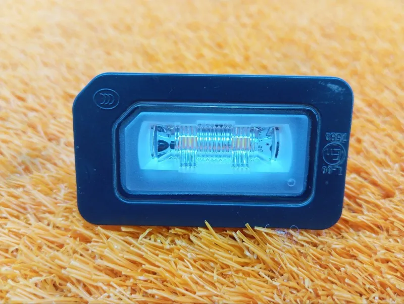 Фонарь подсветки номера