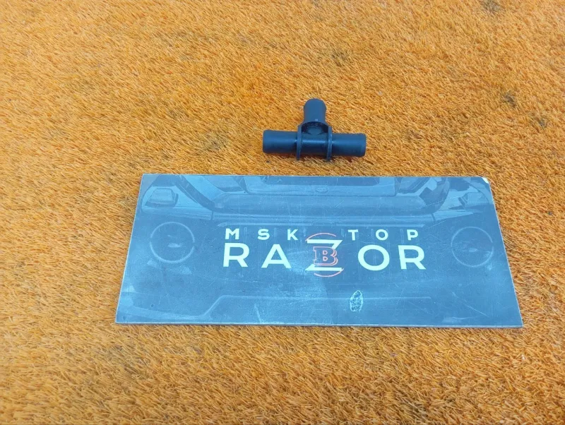 Тройник патрубков печки