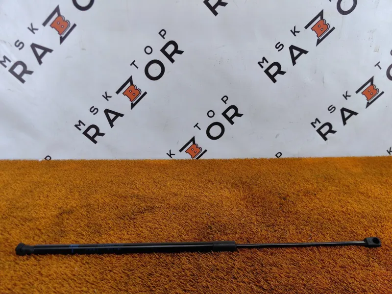 Амортизатор капота