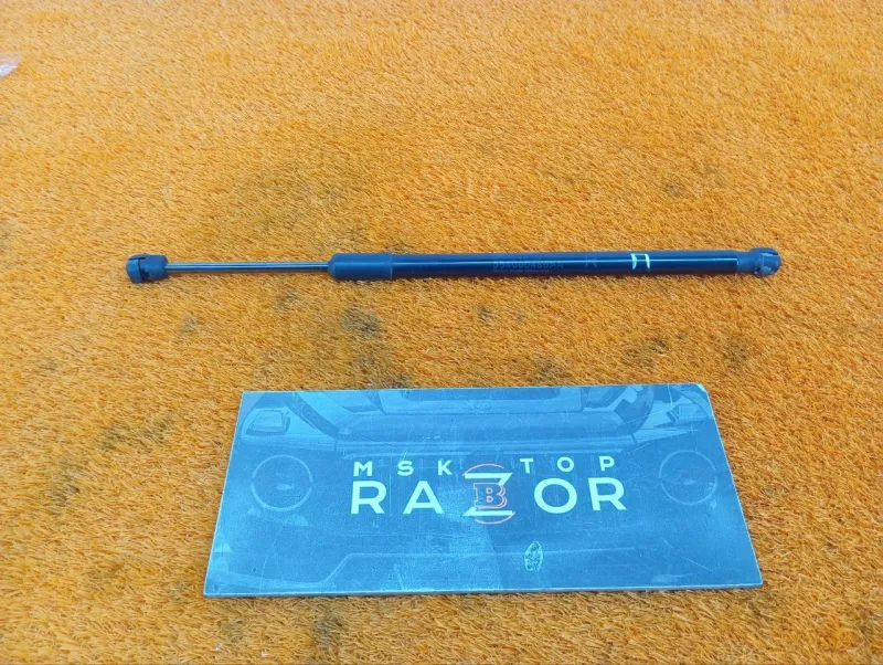 Амортизатор капота