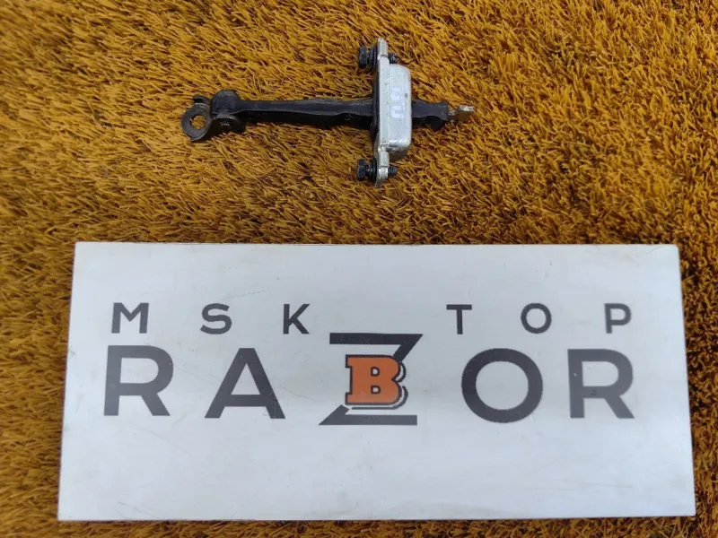 Ограничитель двери