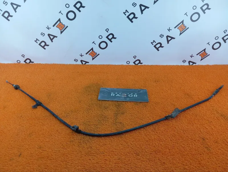 Трос стояночного тормоза