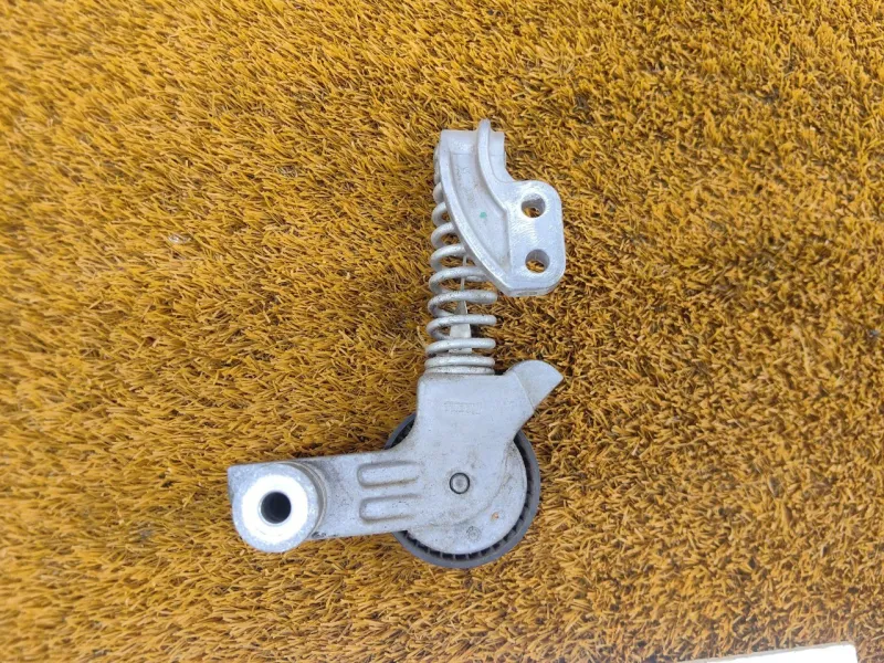 Натяжитель приводного ремня (Ролик натяжитель ремня)