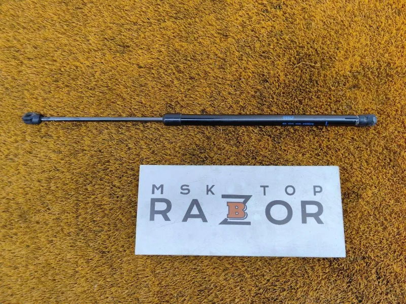 Амортизатор крышки багажника