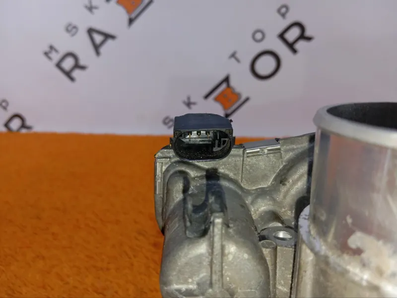 Дроссельная заслонка