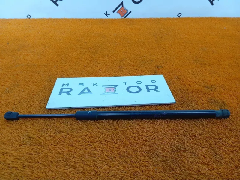 Амортизатор капота