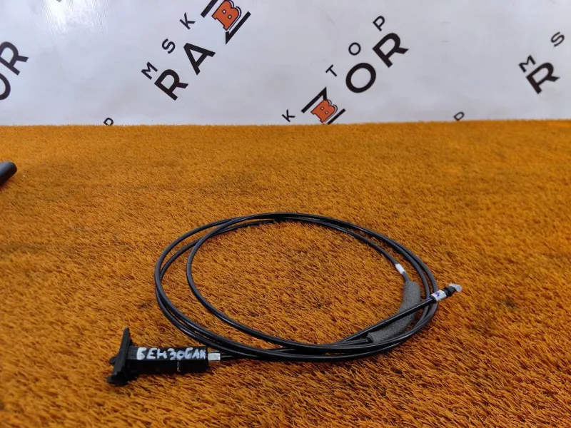 Трос лючка топливного бака