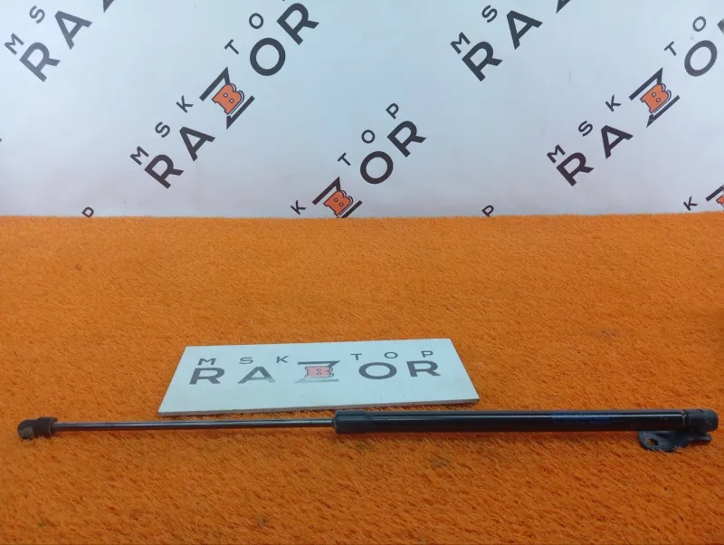 Амортизатор крышки багажника