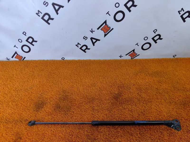 Амортизатор крышки багажника