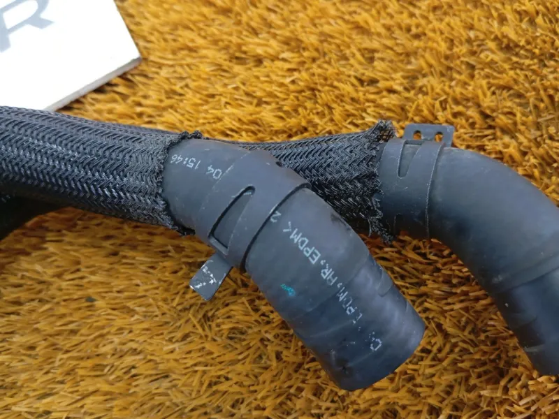 Патрубок радиатора печки