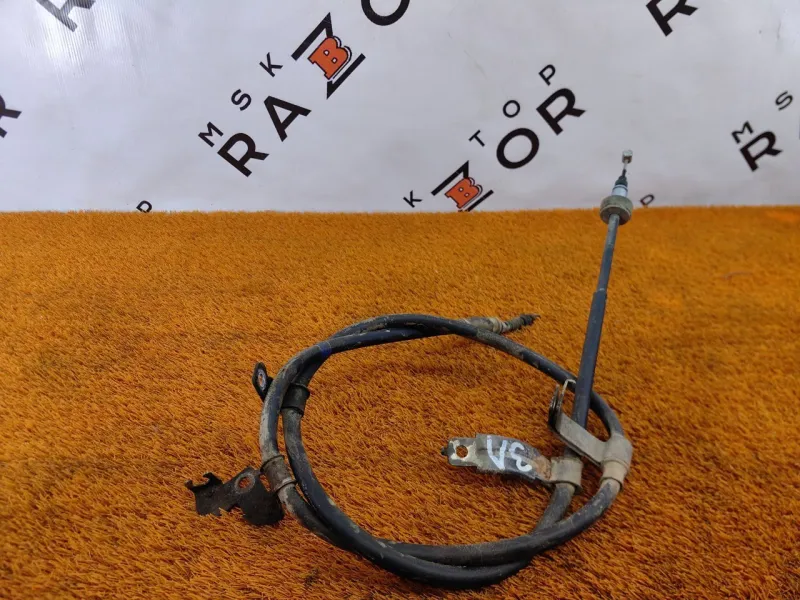 Трос стояночного тормоза